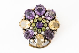 ATTRIBUTED TO DORRIE NOSSITER: A GEMSET CLIP BROOCH