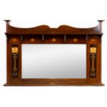 AN ART NOVEAU MARQUETRY INLAID MAHOGANY OVERMANTEL MIRROR