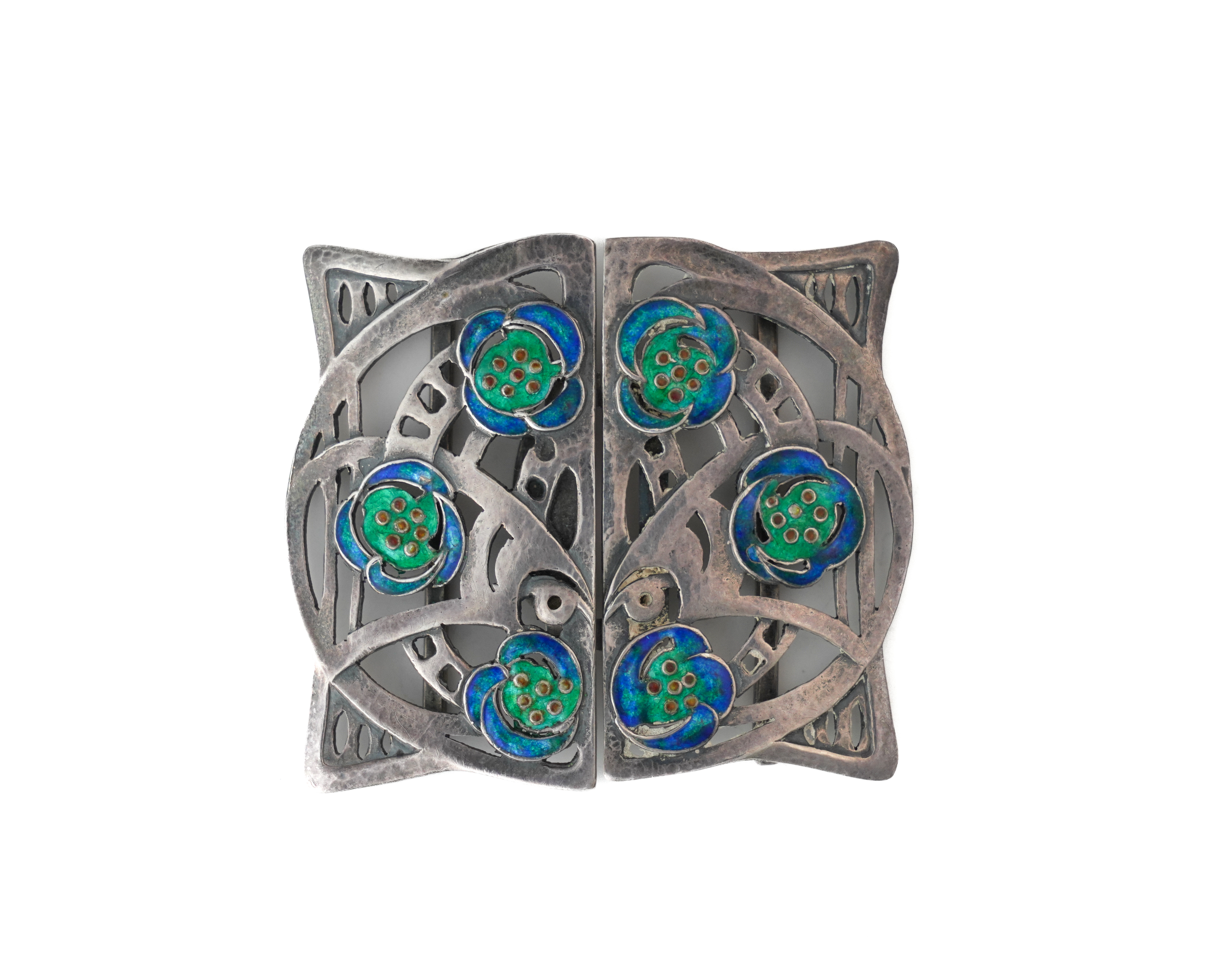 JESSIE MARION KING FOR LIBERTY AND CO; A SILVER AND ENAMELLED TWO PIECE WAISTBELT BUCKLE