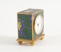 ZENITH: A CHAMPLEVÉ ENAMEL AND BRASS TRAVELLING ALARM CLOCK, CASED