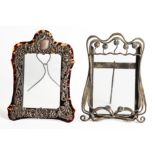 A LATE VICTORIAN SILVER MOUNTED AND TORTOISESHELL SHAPED RECTANGULAR PHOTOGRAPH FRAME AND...