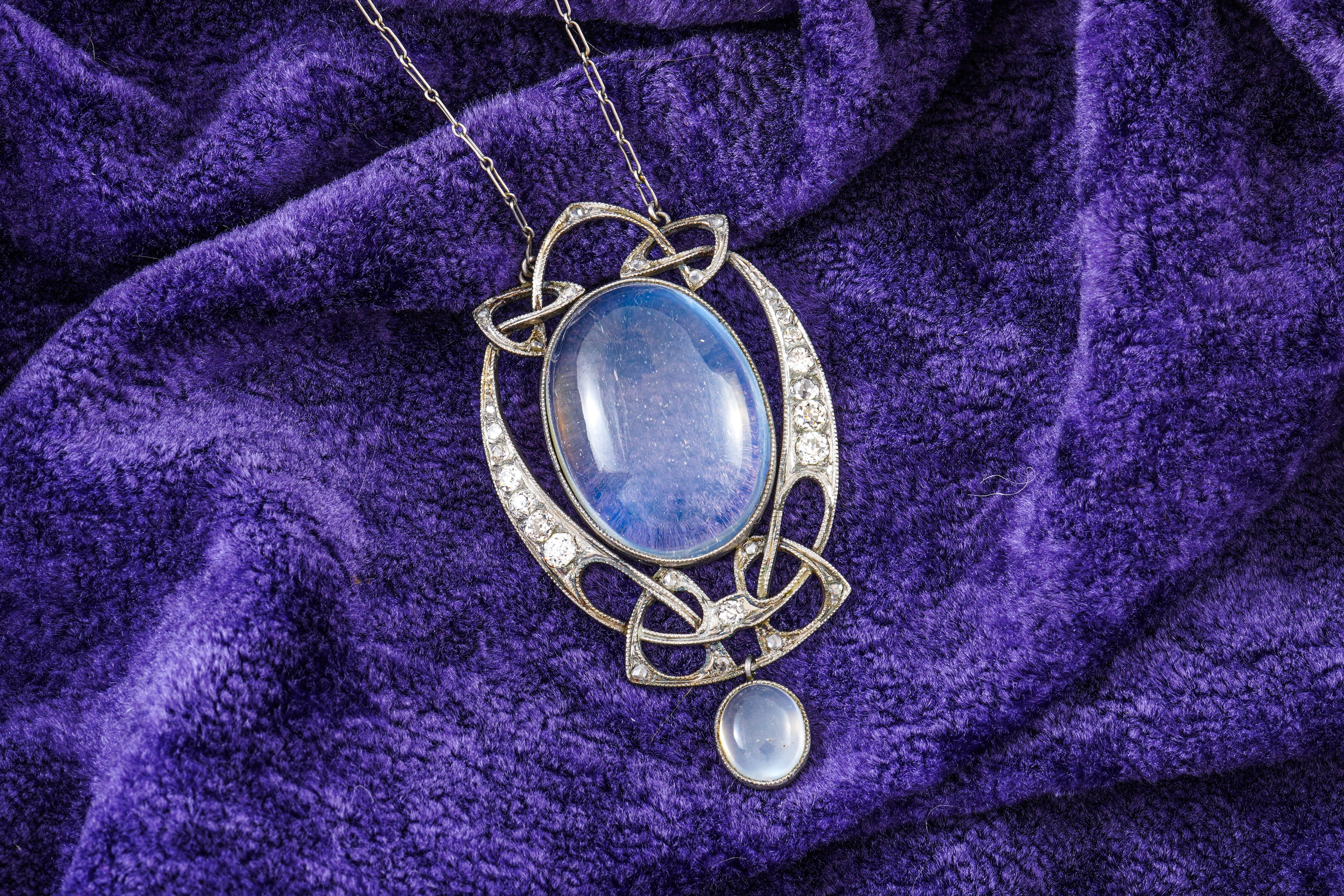 A 20TH CENTURY MOONSTONE AND DIAMOND PENDANT