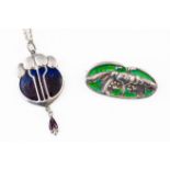 AN EARLY 20TH CENTURY ENAMEL PENDANT AND BROOCH (2)