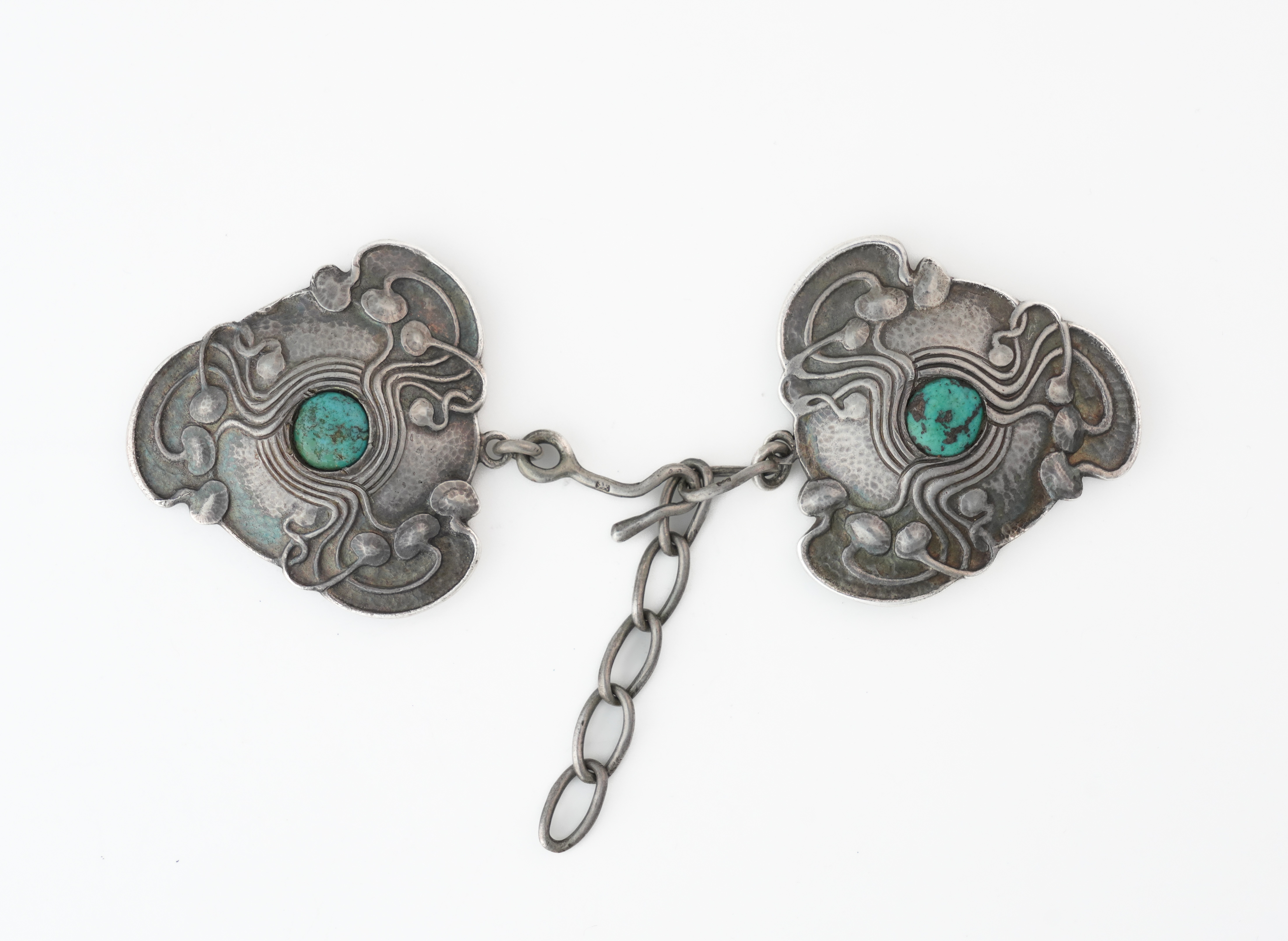 A LIBERTY AND CO SILVER TURQUOISE MATRIX TWO PIECE ART NOUVEAU CLOAK CLASP