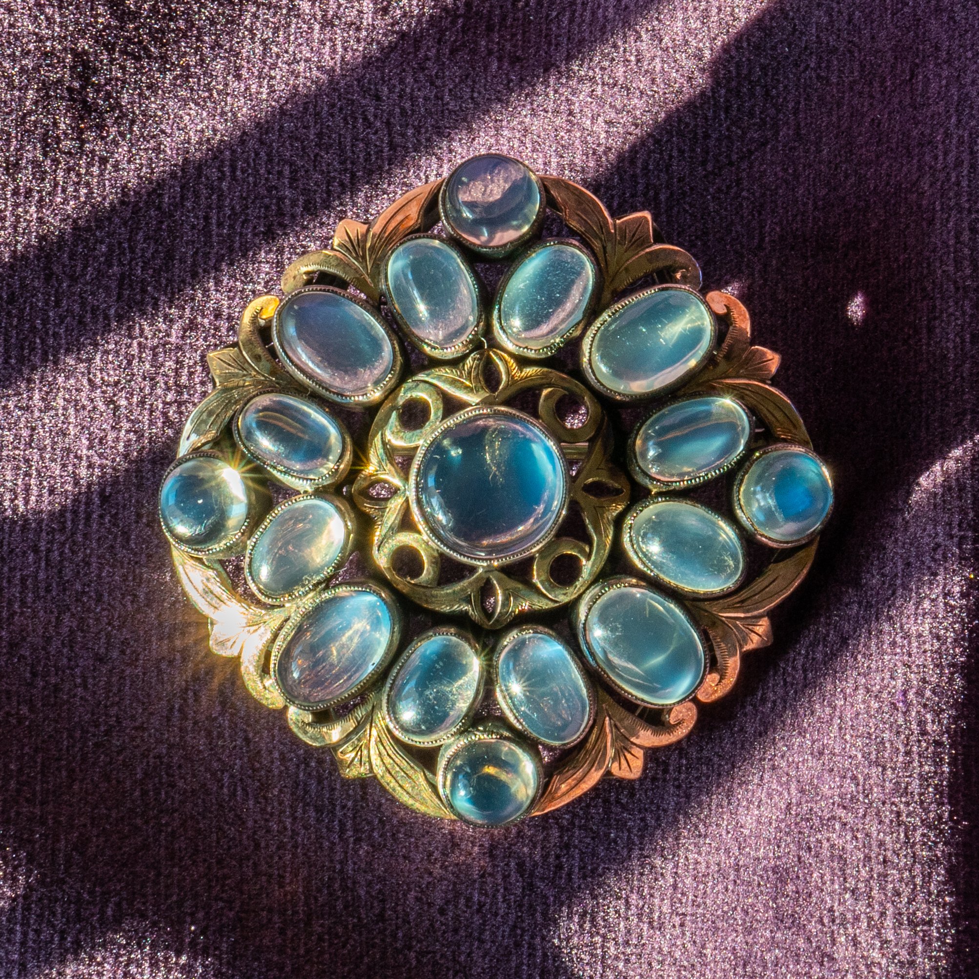 SIBYL DUNLOP - A MOONSTONE BROOCH