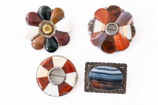FOUR SCOTTISH SILVER MOUNTED AGATE BROOCHES (4)