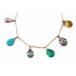 AN EARLY 20TH CENTURY EGG CHARM NECKLACE