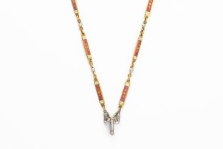 AN EARLY 20TH CENTURY DIAMOND AND ENAMEL CHAIN