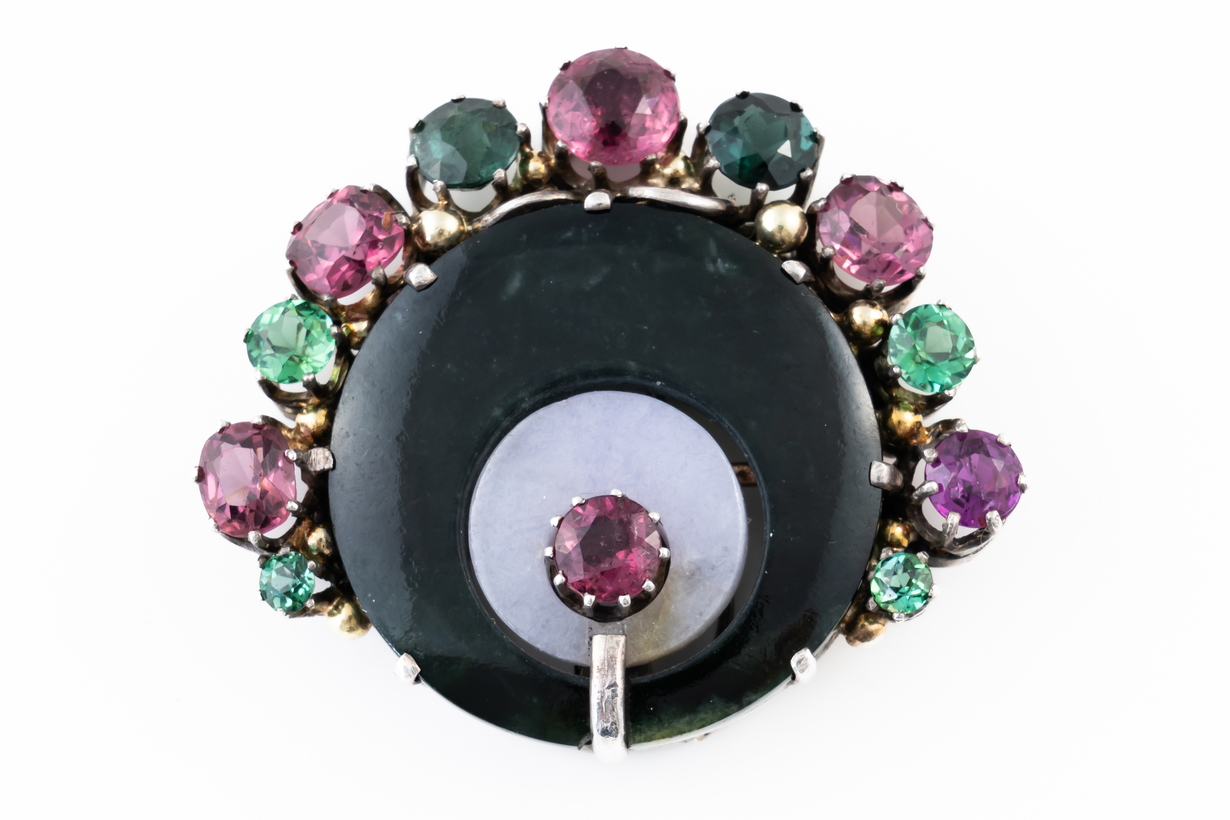 ATTRIBUTED TO DORRIE NOSSITER: A GEMSET CLIP BROOCH