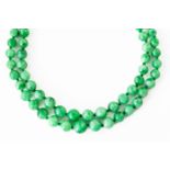 A JADEITE JADE DOUBLE ROW GRADUATED BEAD NECKLACE