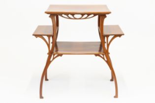 AN ART NOUVEAU WALNUT MULTI-TIERED SIDE TABLE