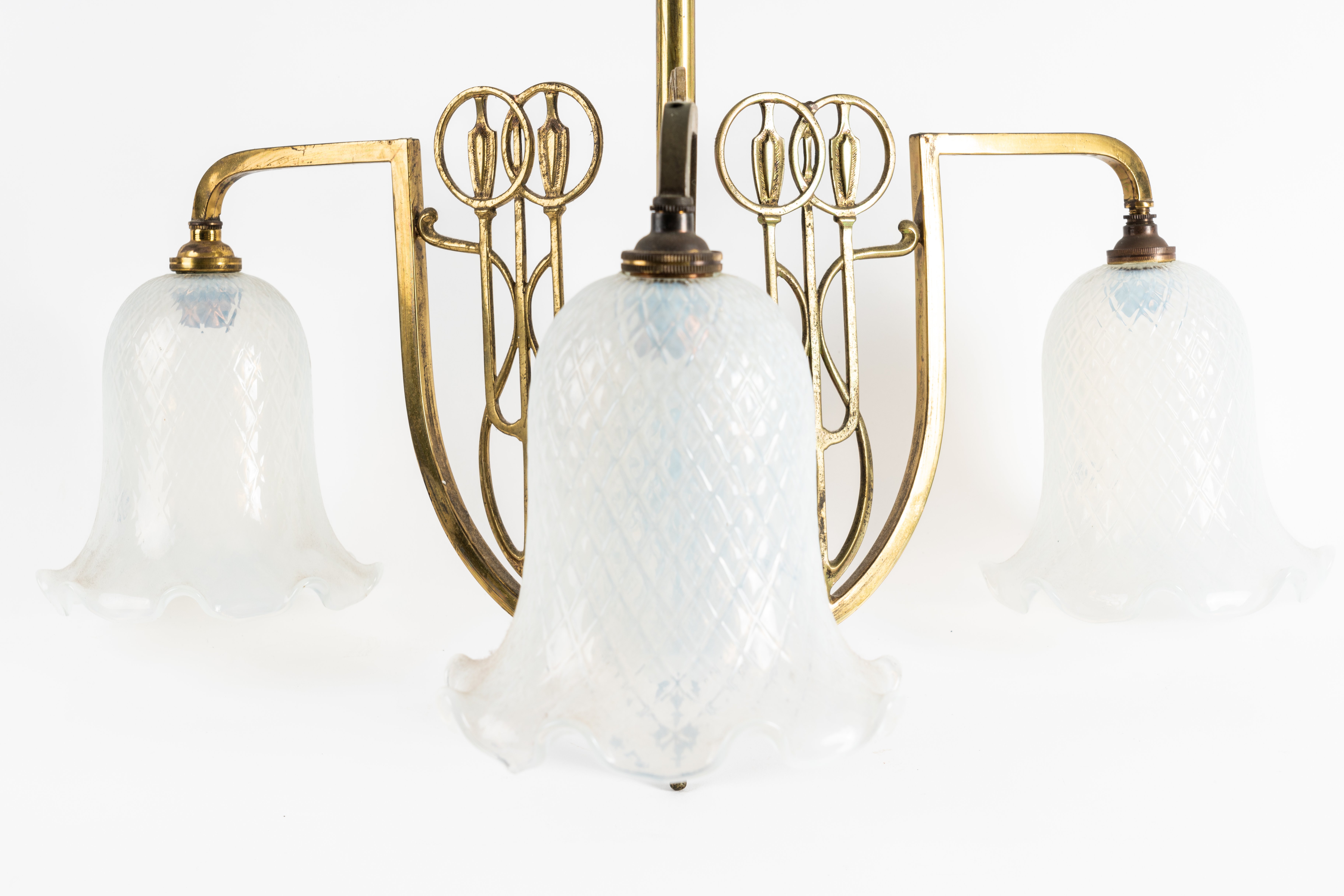 AN ART NOUVEAU BRASS THREE BANCH HANGING LIGHT