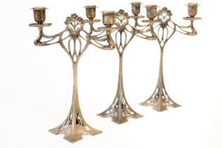 A GARNITURE OF THREE W.M.F PLATED TWIN LIGHT TABLE CANDELABRA (3)