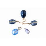 A GROUP OF FIVE BLUE EGG CHARMS (5)