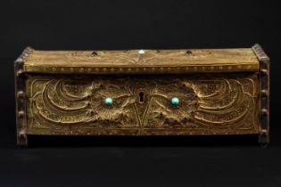 ALFRED DAGUET (1875-1942): A FRENCH ART NOUVEAU EMBOSSED GILT COPPER AND GLASS MOUNTED CASKET...