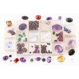A QUANTITY OF UNMOUNTED FACETED AND CABOCHON GEMSTONES (QTY)