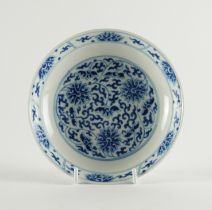 A CHINESE BLUE AND WHITE SAUCER DISH