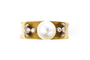 A GOLD, CULTURED PEARL AND DIAMOND RING