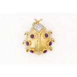 A YELLOW GOLD DIAMOND AND RUBY LADYBIRD BROOCH