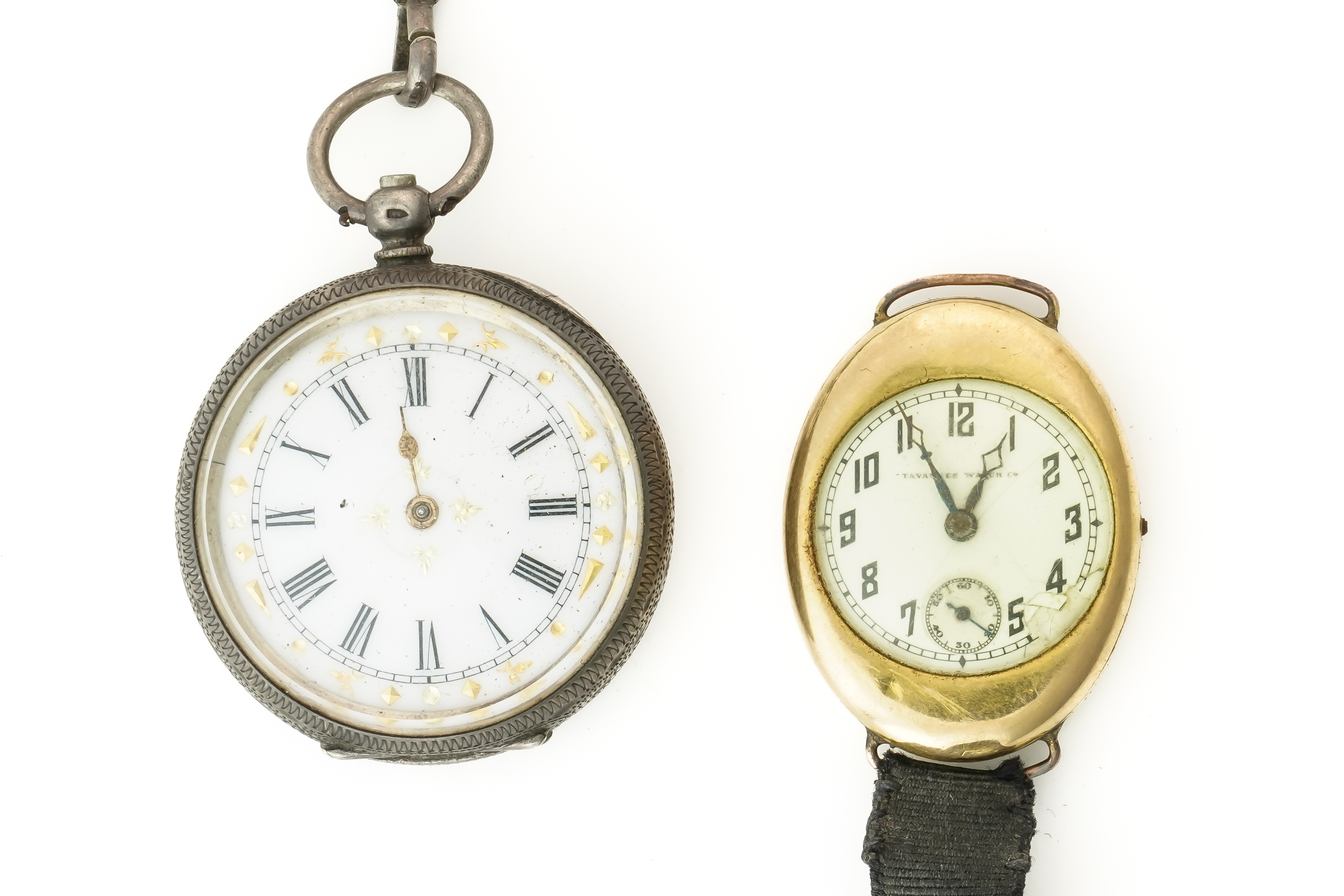 A TAVANNES WATCH CO GOLD OVAL CASED LADY'S WRISTWATCH AND A SILVER FOB WATCH AND CHAIN (3)