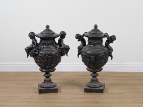 TWO BLACK PAINTED CAST IRON ORNAMENTAL GARDEN URNS (2)