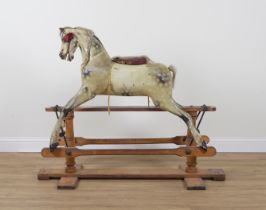 A G & J LINES FOR TRIANGTOIS: A PAINTED DAPPLE GREY WOOD ROCKING HORSE