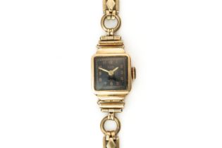 A TITUS GOLD SHAPED RECTANGULAR CASED LADY'S WRISTWATCH