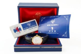 A QUEEN ELIZABETH II GILT METAL AND DIAMOND LADY'S WRISTWATCH