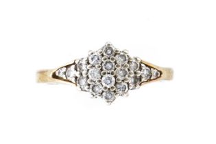 A GOLD AND DIAMOND CLUSTER RING