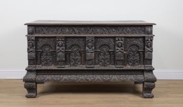 A 17TH CENTURY CARVED OAK CHEST