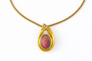 A GOLD, DIAMOND AND GREY OPAL PENDANT WITH CHAIN