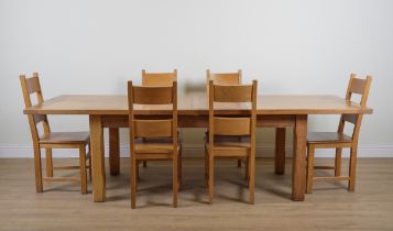 A MODERN OAK EXTENDING DINNING TABLE (7)