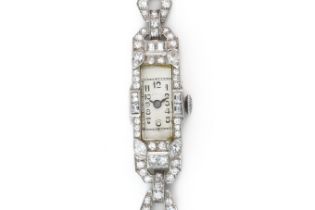 A LADY'S PLATINUM AND DIAMOND COCKTAIL BRACELET WRISTWATCH