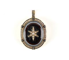 A VICTORIAN GOLD BANDED AGATE AND SEED PEARL OVAL PENDANT LOCKET