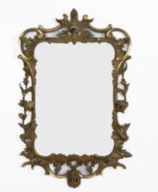 A GEORGE III GILTWOOD WALL MIRROR