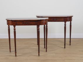 A PAIR OF MAHOGANY BOW FRONT SINGLE DRAWER CONSOLE TABLES (2)
