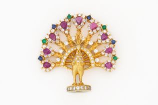 A YELLOW GOLD AND VARICOLOURED GEMSTONE PEACOCK BROOCH