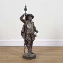 A FRENCH SPELTER FIGURE OF A STANDING CAVALIER