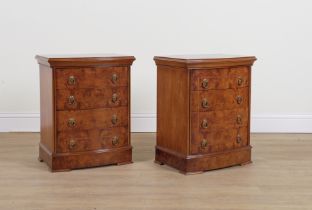 A PAIR OF 20TH CENTURY POLLARD OAK BOWFRONT FOUR DRAWER BEDSIDE CHESTS (2)