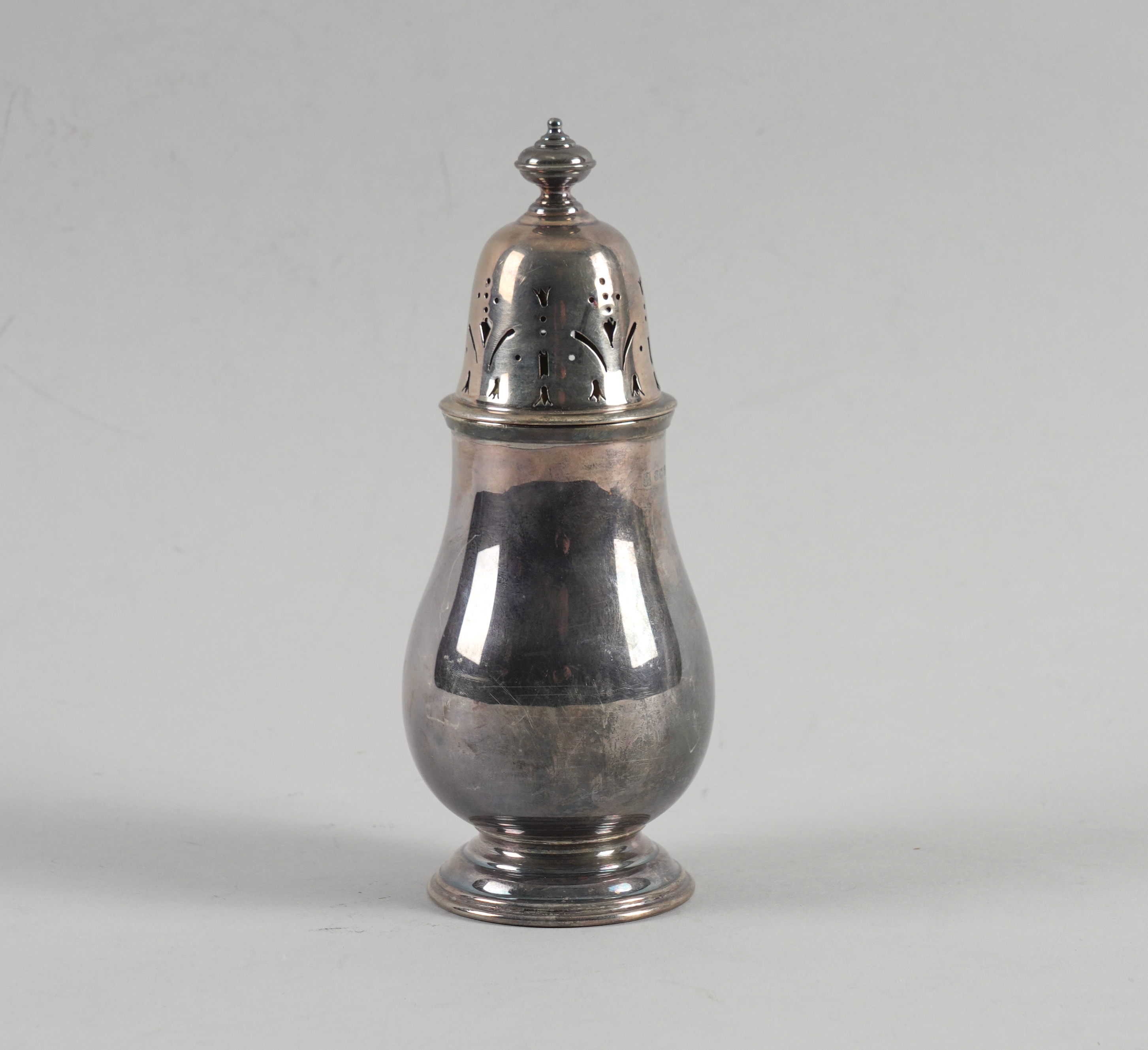 A SILVER SUGAR CASTER