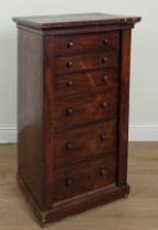 A VICTORIAN ROSEWOOD SECRETAIRE FIVE DRAWER WELLINGTON CHEST