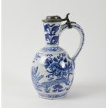 A DUTCH DELFT PEWTER MOUNTED BLUE AND WHITE JUG