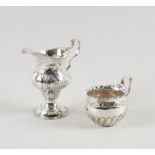 TWO SILVER CREAM JUGS (2)