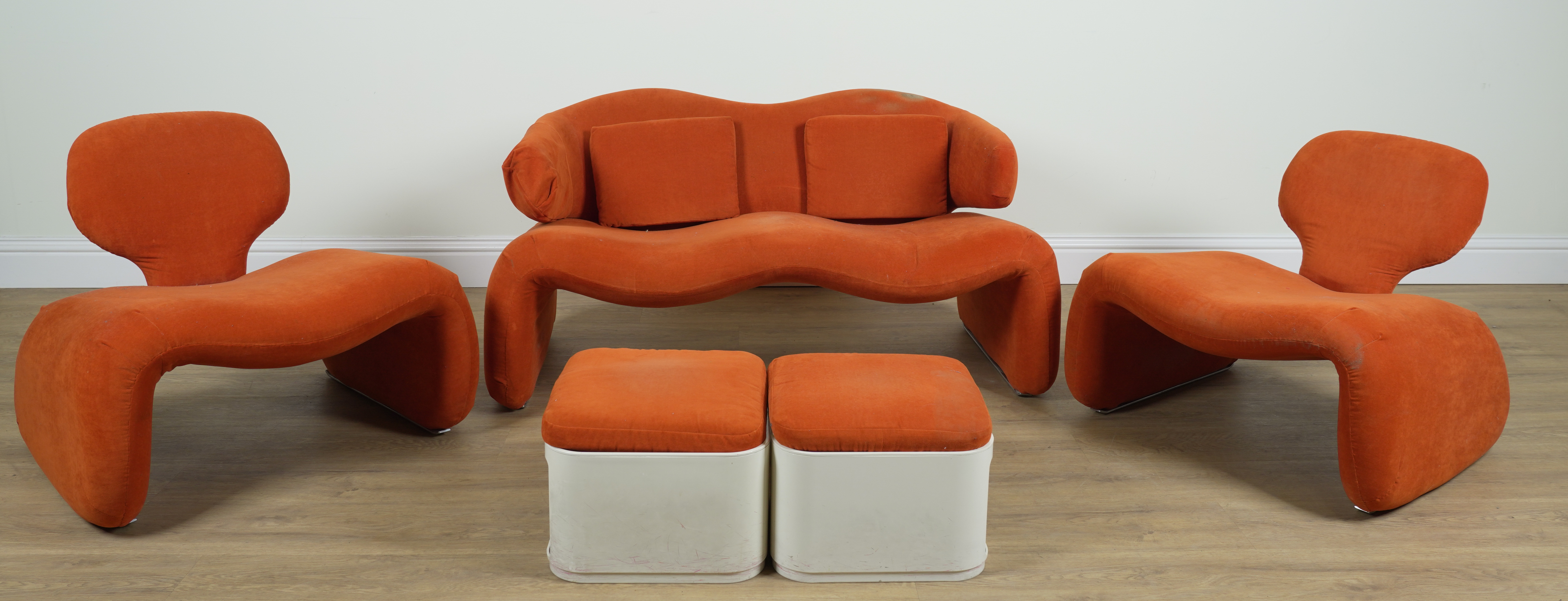 PROBABLY OLIVIER MOURGUE; AN ORANGE UPHOLSTERED SOFA AND CHAIRS (5)
