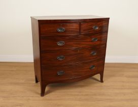 A REGENCY MAHOGANY BOWFRONT FIVE DRAWER CHEST