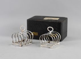 A PAIR OF SILVER TOASTRACKS (2)