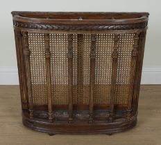 A LATE 19TH CENTURY OAK AND BERGERE BOWFRONT STICK STAND