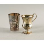 A VICTORIAN SILVER CHRISTENING MUG AND A SILVER BEAKER (2)