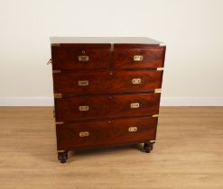 A CAMPAIGN STYLE BRASS BOUND MAHOGANY FIVE DRAWER CHEST