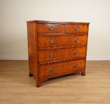 A GEORGE III LATER POLLARD OAK VENEERED FIVE DRAWER CHEST